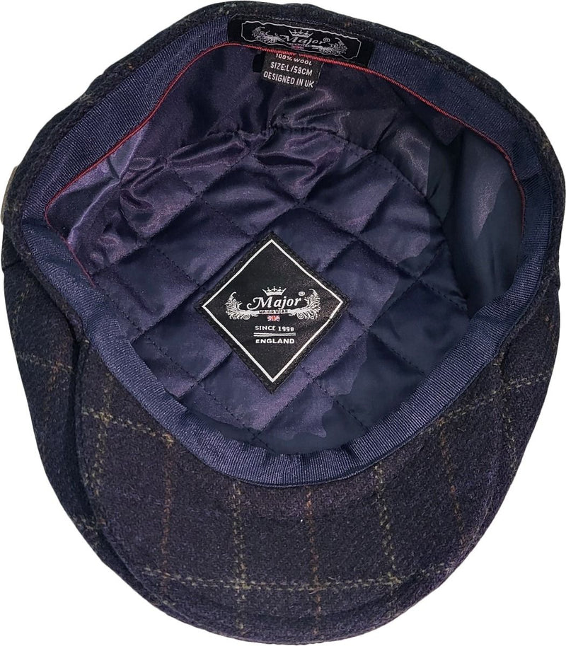 Ternet sixpence i marineblå - set fra siden